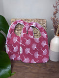 Bavoir rose/rouge